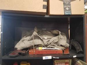 lot 344 image: Selection of gun related items - holsters, clip, jacket