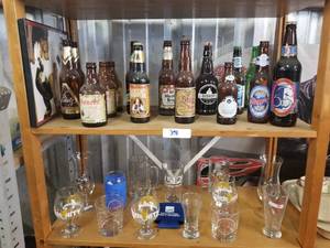 lot 398 image: Selection of beer bottles and barware