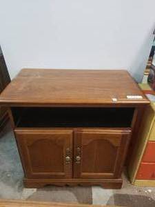 lot 191 image: Wood TV stand - 18 by 31 by 32