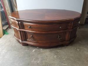 lot 97 image: Very nice oval coffee table with drawers - 30 by 50 by 21