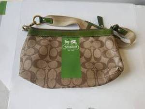 lot 12 image: Coach handbag - authenticity unknown