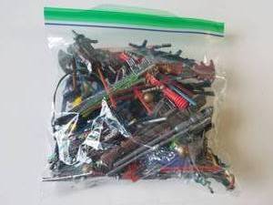 lot 14 image: Large selection of Star Wars accessories - light sabers, guns, and more