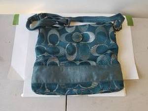 lot 31 image: Coach handbag - authenticity unknown