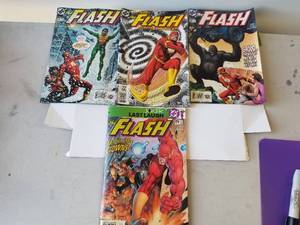 lot 34 image: Selection of 4 Flash comics