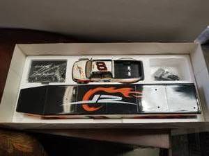 lot 105 image: Dae Earnhardt Jr  DMP Show Trailer Collection. 124 Chevy Dually-Crew Cab and Show Trailer