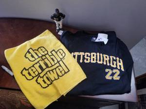 lot 143 image: Pittsburgh sports lot - terrible towl, pirates shirt, etc.