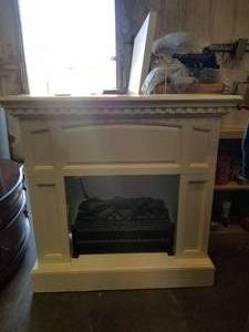 lot 197 image: Fireplace mantle with electric heater with remote