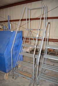 lot 55 image: Cotterman Industrial Rolling Ladder 6-Step Gray