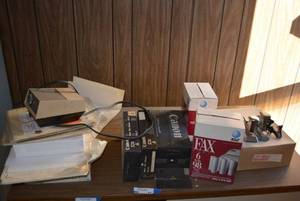 lot 84 image: Misc. Office Supplies Paper Reams, Canon Toner NP-15, Fax Paper Rolls, Staplers
