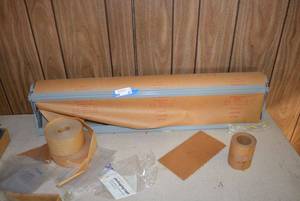 lot 87 image: Brown Paper Roll and Cutter