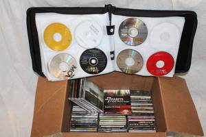 lot 135 image: CDs Collection Includes Willie Nelson, Leann Rimes, Josh Groban� and CD Holder