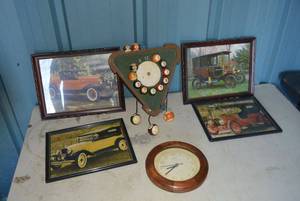 lot 31 image: Antique Car Pictures and Clocks as shown