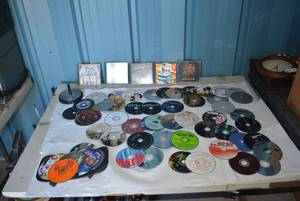 lot 41 image: CD Collection Brad Paisley, Green Day, and Movies Clint Eastwood, Baby Mama, Fightplan and Games Rome, Viking Invasion and More