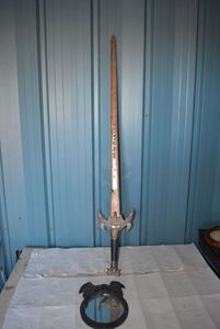 lot 45 image: Metal Sword and Dragon Framed Mirror