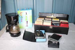 lot 62 image: 8 Track Lot Tapes and Converters for 8 track players, Coffee maker, Lava lamp