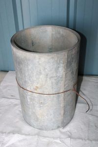 lot 81 image: Roll of Sheet Metal 16 x 24 approx. and bag of Nylon Strapping Clips