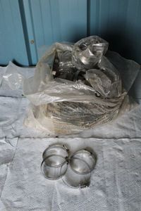 lot 82 image: Bag of 3 inch hose clamps and more 20 plus clamps