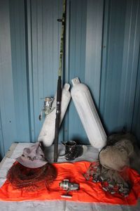 lot 85 image: Fishing lot, including Casting net, bumpers, rod and reel, boat prop and more