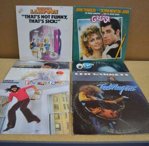 lot 99 image: Vinyl Albums Includes National Lampoons, Grease, Olivia Newton-John, Chuck Mangione, Barry Manilow,  Michael Jackson, Leif Garrett, and Ted Nugent