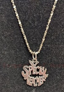 lot 8 image: Sterling Silver Pendant and Chain. Chain is 19.75 long. Pendant is approximately 1 tall and 1 wide.