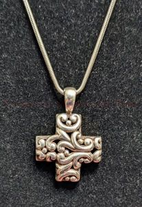 lot 10 image: Sterling Silver Cross and Chain. Chain is 18.5 long and Cross is about 1.5 long and 1 wide.