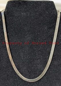 lot 17 image: Sterling Herringbone Chain 18 tall.