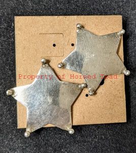 lot 24 image: Pair of Star Sterling Silver Earrings about 1.5 on diameter.