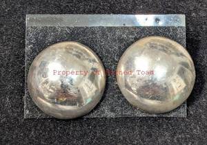 lot 29 image: Pair of Clip on Sterling Earring.