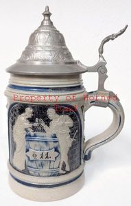 lot 66 image: Beer Stain. Approximately 8 tall. No cracks or chips.