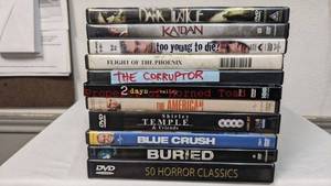 lot 53 image: Lot of 11 DVDs