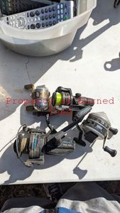 lot 108 image: Various Fishing Reels to include Zebco, Shimano, and Shakespeare.