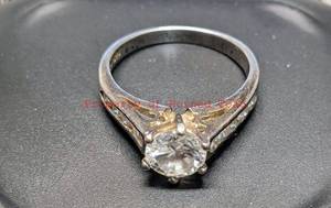 lot 145 image: Sterling Silver Ring Sz 9 with Cubic Zirconia