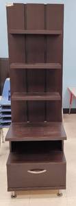lot 32 image: DECORATIVE DISPLAY UNIT WITH STORAGE DRAWER AS SHOWN. APPROX. 18.75 W x 20 D x 60.5 H.