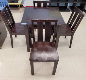 lot 33 image: (1) SQUARED WOODEN TABLE AND (4) MATCHING WOODEN CHAIRS AS SHOWN. TABLE APPROX. 30 W x 30 D x 30 H. CHAIRS APPROX. 17.75 W x 18.5 D x 33.5 H. SOLD 5 X THE MONEY