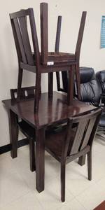 lot 64 image: (1) SQUARED WOODEN TABLE AND (4) MATCHING WOODEN CHAIRS AS SHOWN. TABLE APPROX. 30 W x 30 D x 30 H. CHAIRS APPROX. 17.75 W x 18.5 D x 33.5 H. SOLD 5 X THE MONEY