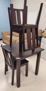 lot 79 image: (1) SQUARED WOODEN TABLE AND (4) MATCHING WOODEN CHAIRS AS SHOWN. TABLE APPROX. 30 W x 30 D x 30 H. CHAIRS APPROX. 17.75 W x 18.5 D x 33.5 H. SOLD 5 X THE MONEY