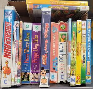 lot 96 image: ASSORTED DVD AND VHS MOVIES AS SHOWN.