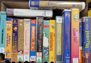lot 97 image: ASSORTED VHS MOVIES AS SHOWN.