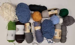 lot 135 image: ASSORTED YARN IN VARIOUS STYLES AND COLORS AS SHOWN.