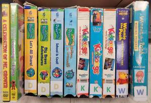 lot 137 image: ASSORTED DVD AND VHS MOVIES AS SHOWN.