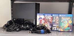 lot 166 image: SONY PLAYSTATION 4 500GB BLACK GAMING CONSOLE MODEL CUH-1001A WITH CONTROLLER, CABLES, AND 4 GAMES AS SHOWN. CHECK IT OUT