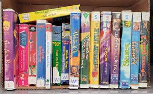 lot 168 image: ASSORTED DVD AND VHS MOVIES AS SHOWN.