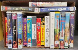 lot 174 image: ASSORTED DVD AND VHS MOVIES AS SHOWN.