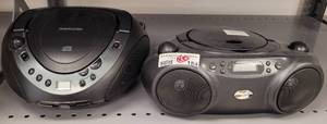 lot 184 image: (1) MEMOREX CDRADIO BOOMBOX MODEL MP8806 AND (1) GPX CDRADIO BOOMBOX MODEL BC232BRS AS SHOWN. SOLD 2 X THE MONEY