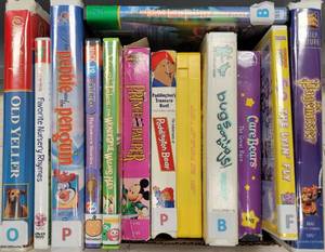 lot 205 image: ASSORTED DVD AND VHS MOVIES AS SHOWN.