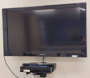 lot 1 image: (1) SAMSUNG 52 TV MODEL LN52A530P1F WITH REMOTE AND (1) SONY VCR  DVD RECORDERPLAYER COMBO MODEL RDR-VX560 WITH REMOTE AS SHOWN. BUYER IS RESPONSIBLE FOR PROPER REMOVAL