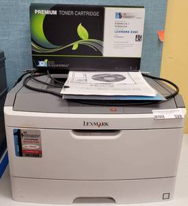 lot 328 image: LEXMARK LASER PRINTER MODEL 4513 WITH CABLES, PAPERWORK, AND TONER AS SHOWN.