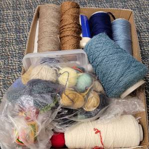 lot 337 image: LOT OF ASSORTED YARN IN VARIOUS STYLES AND COLORS AS SHOWN.