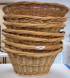lot 339 image: (7) LARGE OVAL SHAPED BASKETS IN STYLE SHOWN. EACH APPROX. 23 W x 10 H. SOLD 7 X THE MONEY