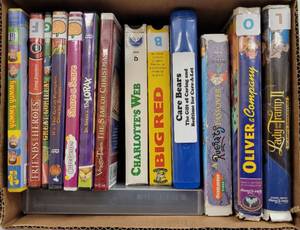lot 379 image: ASSORTED DVD AND VHS MOVIES AS SHOWN.